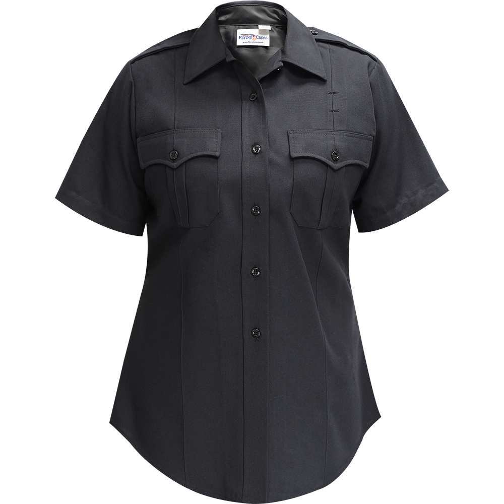 Product shot of a Flying Cross women's short sleeve dark navy blue uniform shirt featuring a button-down front, two breast pockets with flaps, and black buttons.
