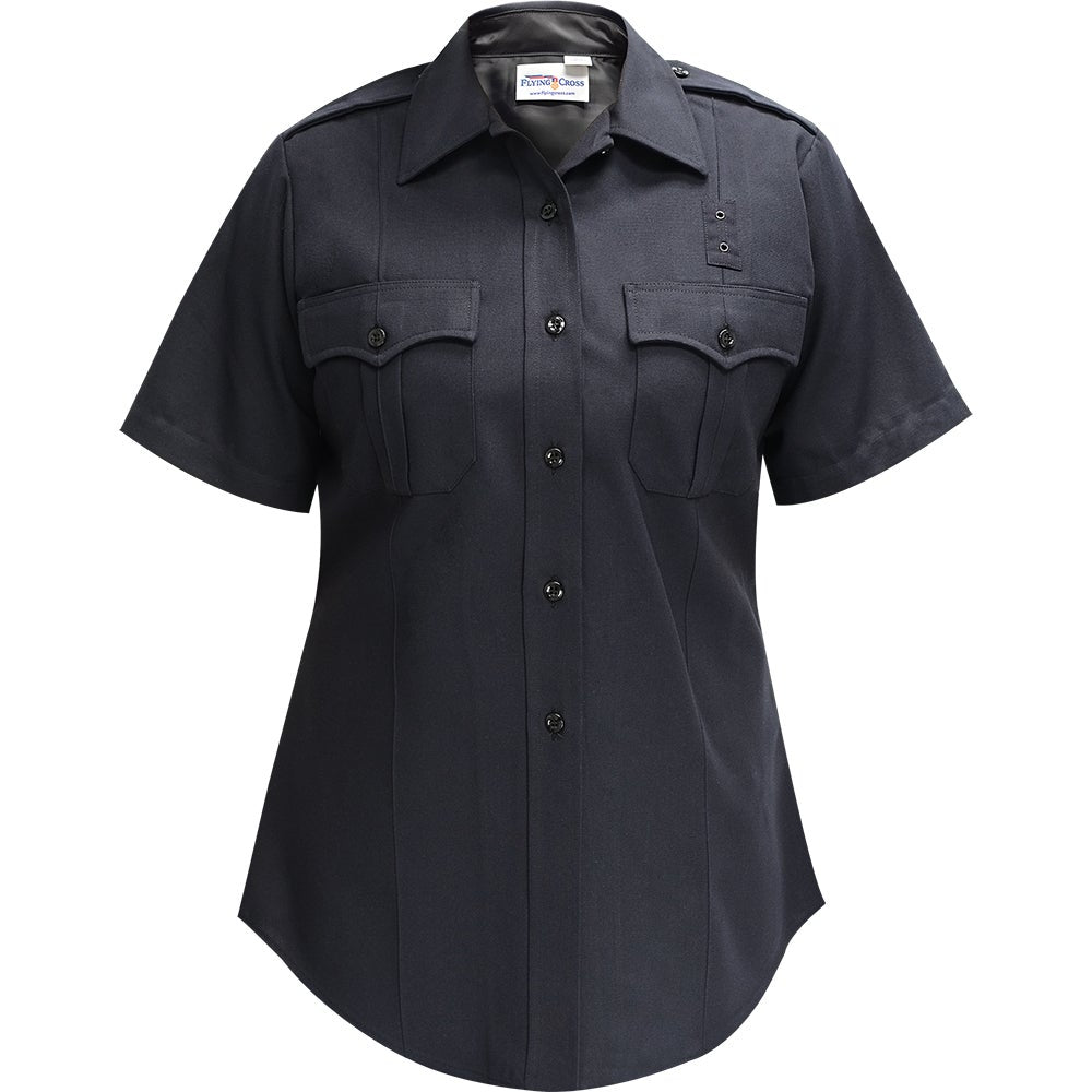 Product shot of a Flying Cross women's short sleeve navy blue uniform shirt featuring a collared shirt, two breast pockets with flaps and black buttons