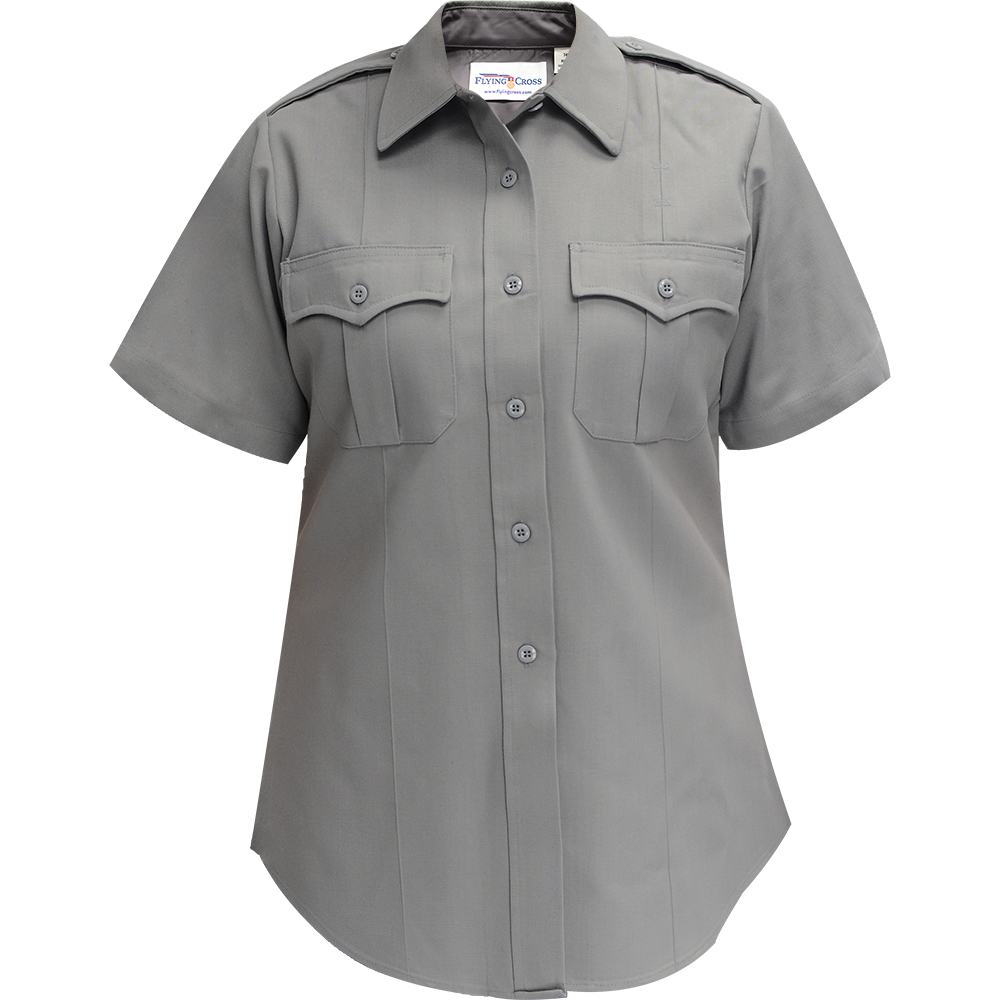 Product shot of a Flying Cross women's short sleeve gray shirt featuring a collared neckline, button front closure, and two chest pockets with button flaps showcasing a muted color palette and subtle texture