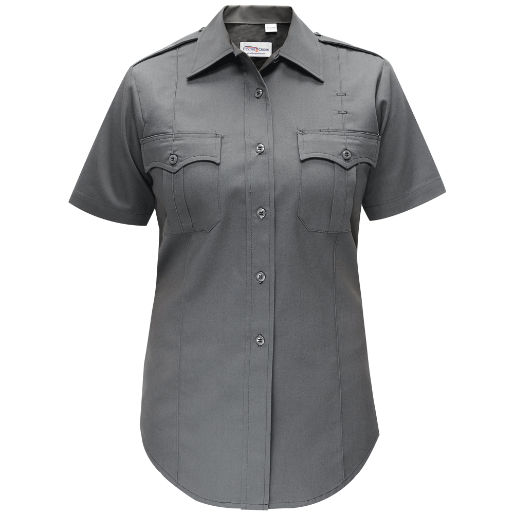 Product shot of a Flying Cross women's short sleeve charcoal gray uniform shirt featuring two chest pockets, a button-down front, and a curved hem
