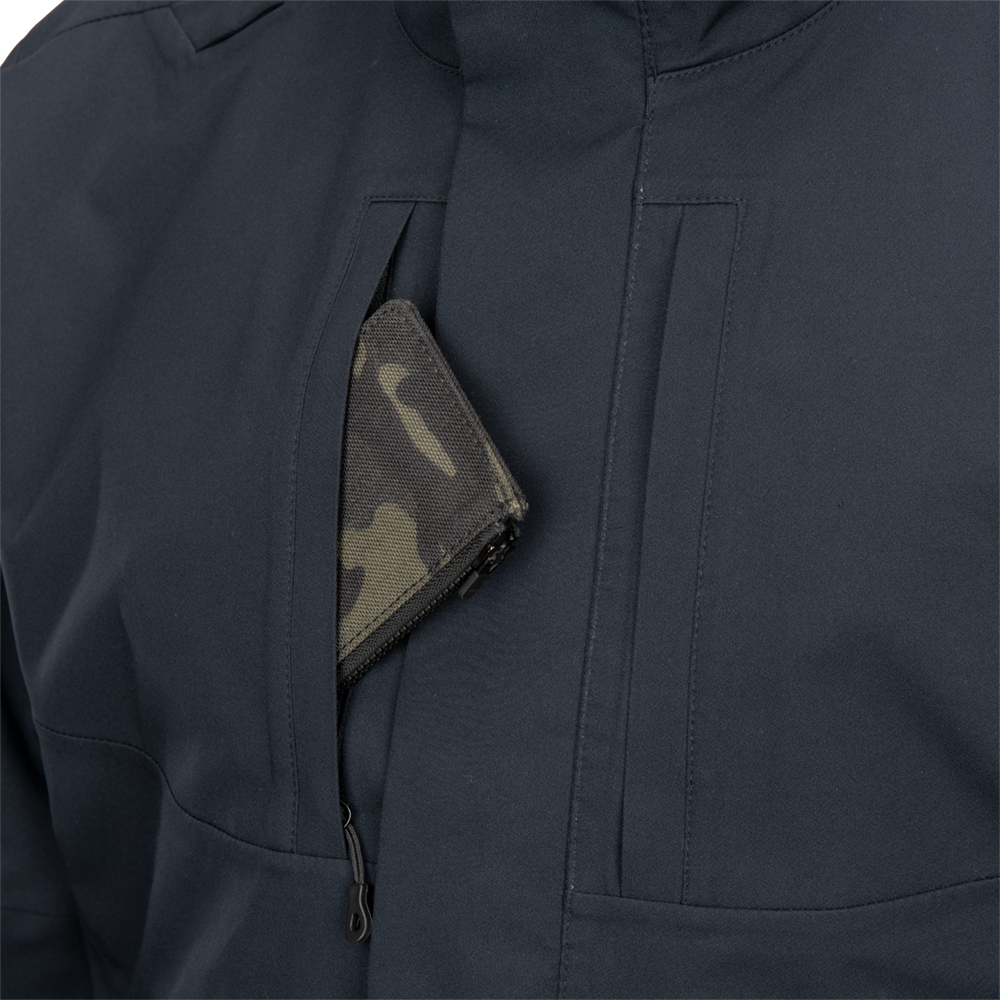 Close-up product shot of a dark navy jacket with a camouflage-patterned wallet in a zippered pocket showing subtle stitching and a sleek zipper pull