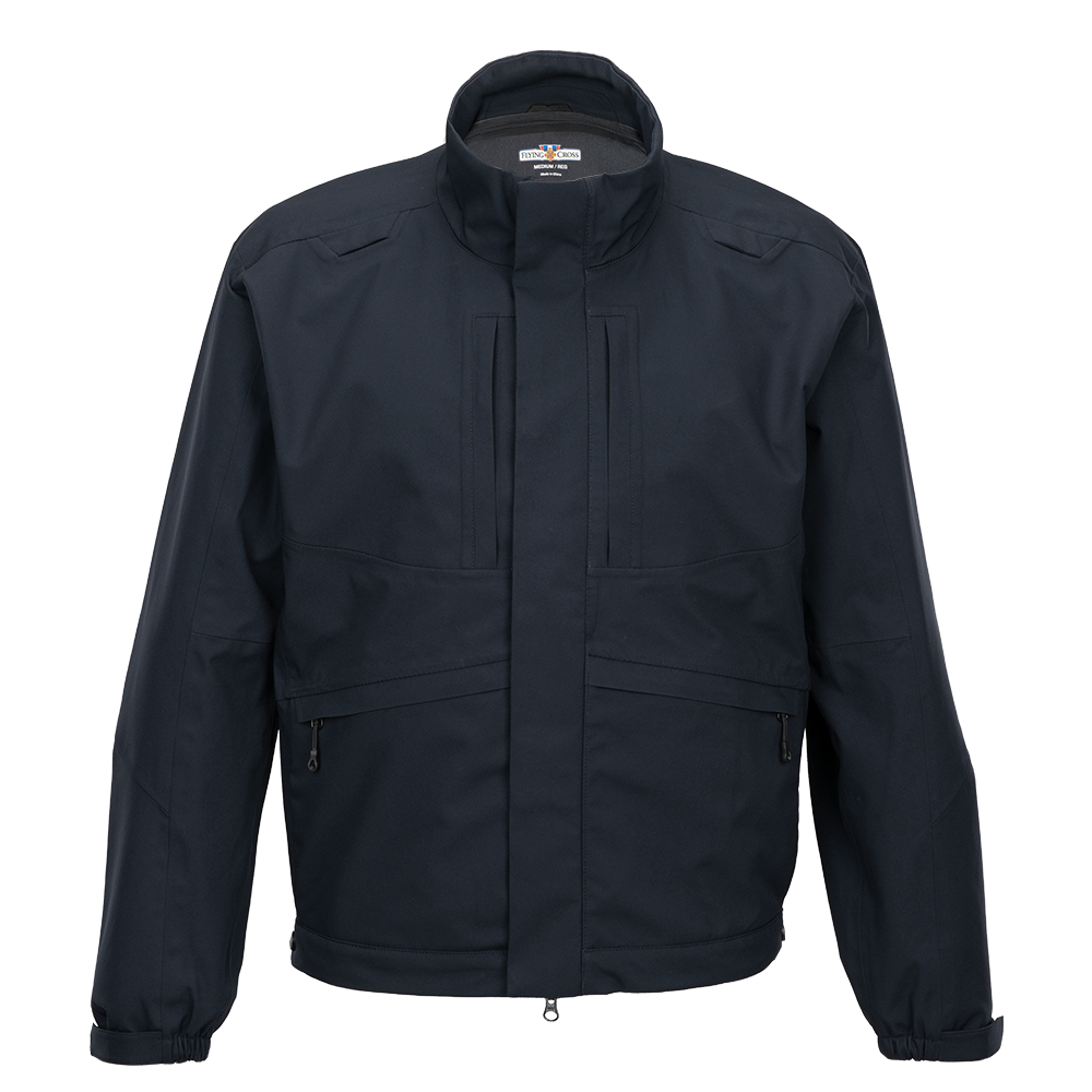 Flying Cross men's navy softshell jacket featuring a stand-up collar zippered pockets and ribbed cuffs.