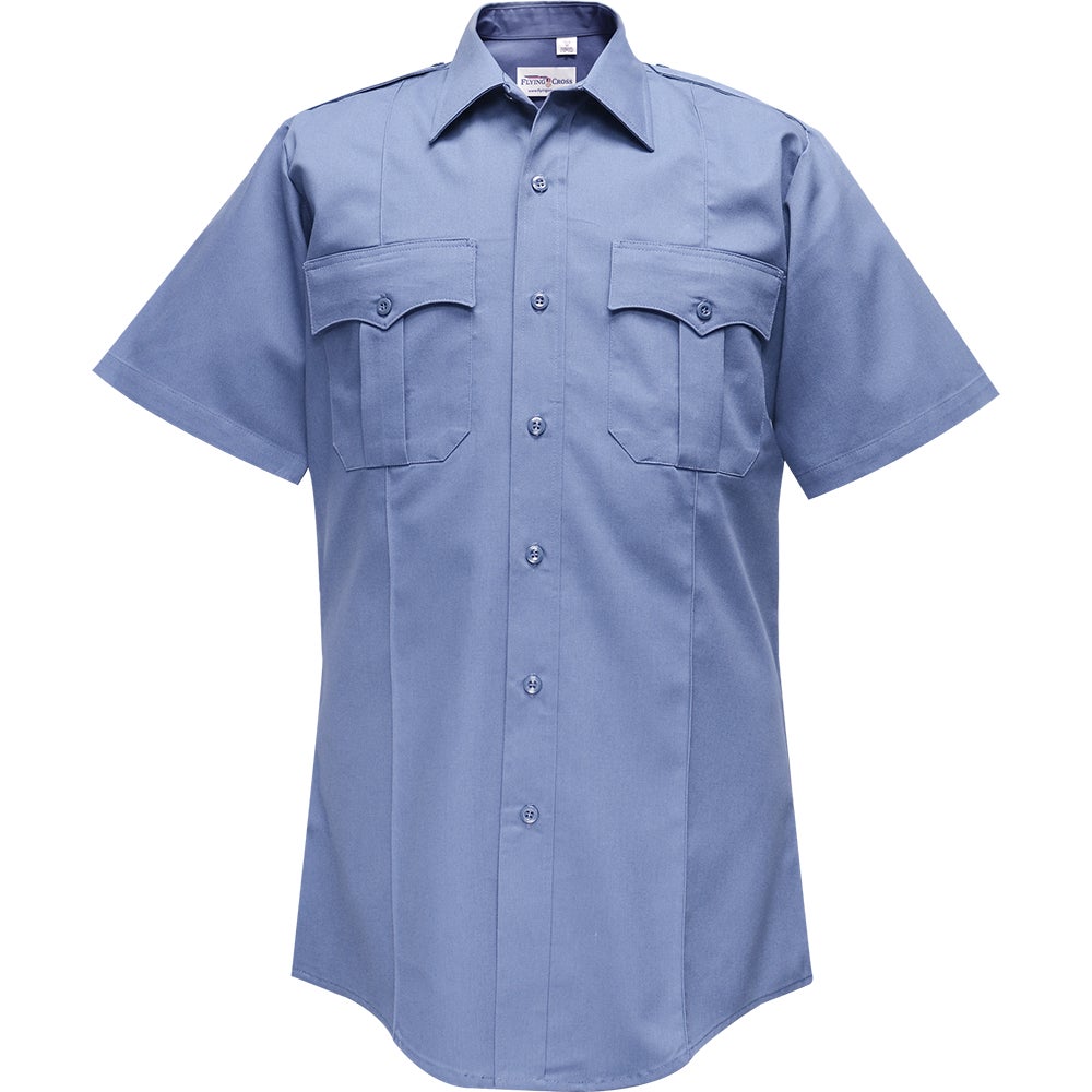 Product shot of a Flying Cross short-sleeve, light blue uniform shirt featuring two chest pockets and a button-down front showcasing a crisp fabric and tailored fit