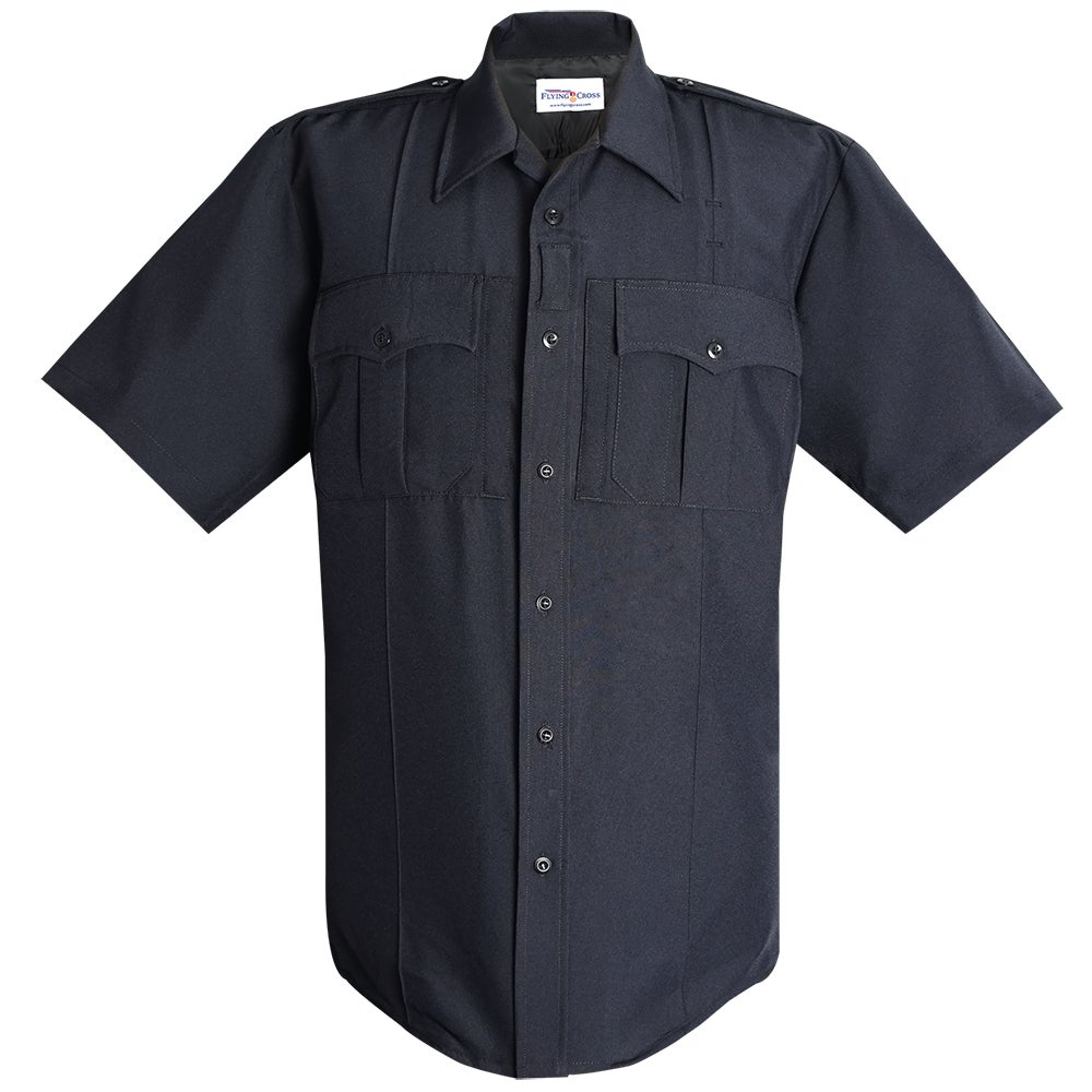 Product shot of a Flying Cross dark navy blue short-sleeved shirt featuring two chest pockets and a button-down front with black buttons showcasing its durable fabric and clean professional style