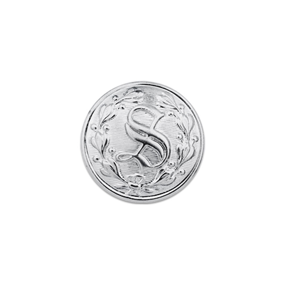 Silver metal button featuring a capital S surrounded by a leaf wreath with a textured background and ornate detailing