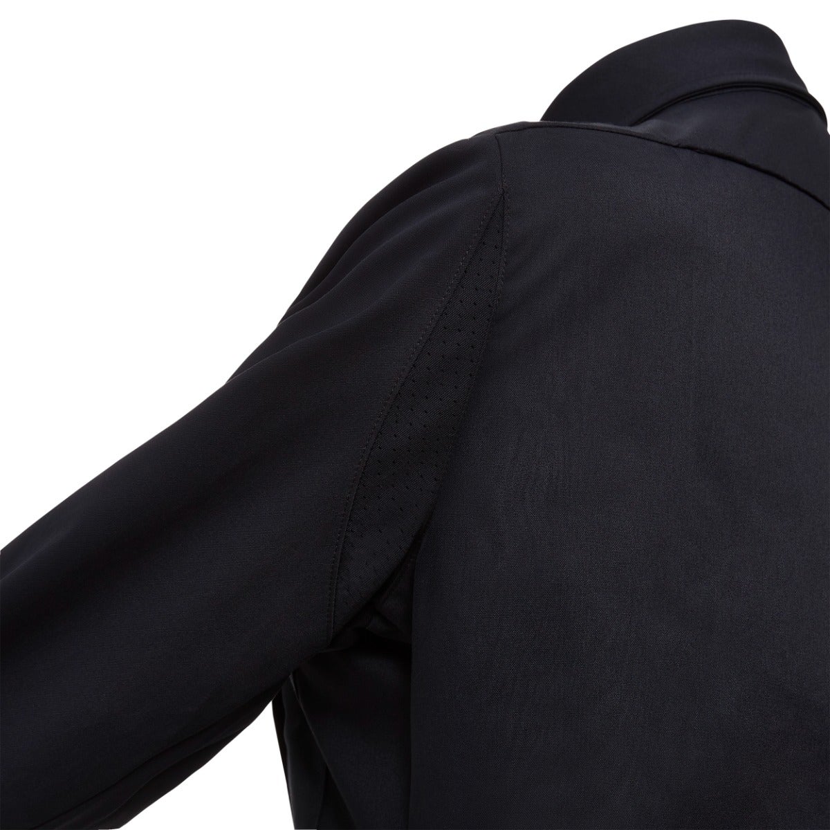 Product shot showing a black softshell jacket with perforated detailing and subtle stitching on the shoulder