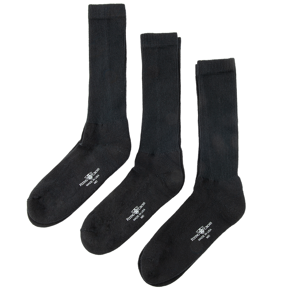 Product shot of three pairs of black Flying Cross crew socks made in the USA showing the logo and MD detail