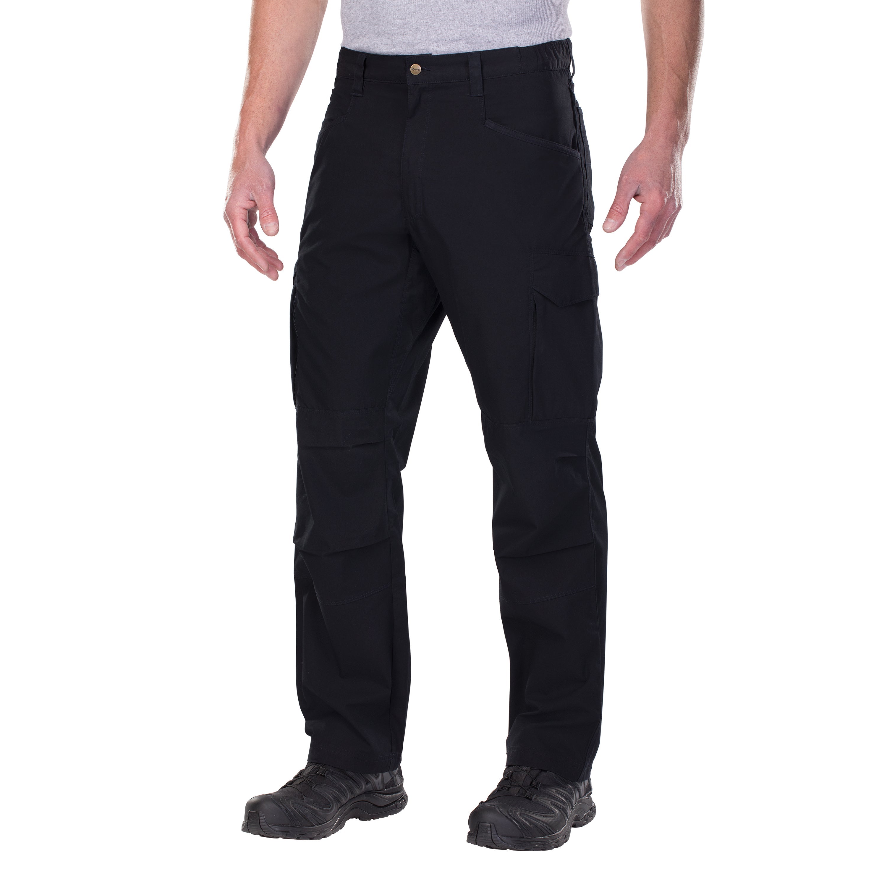Product shot showing a person wearing black tactical pants with multiple pockets and dark tactical boots against a white background