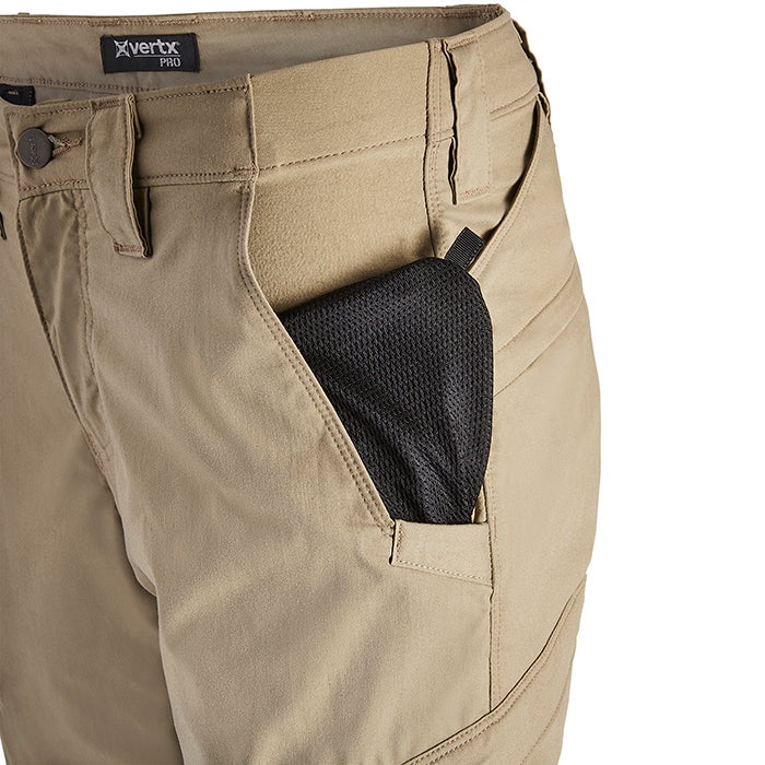 Product shot showing Vertx Pro pants tan fabric with a black mesh pocket detail and subtle stitching