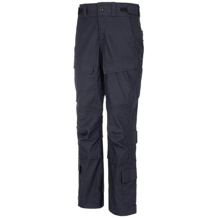 Product shot of dark navy blue tactical pants with multiple pockets and reinforced knees showing a button fly and adjustable waistband