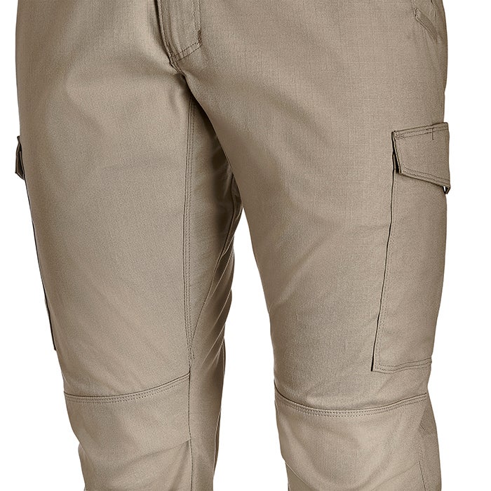 Close-up product shot of beige tactical cargo pants showcasing reinforced stitching knee patches and multiple pockets