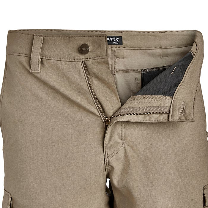 Product shot of Vertx Pro pants showing beige fabric, a dark gray interior pocket, and a metal zipper pull