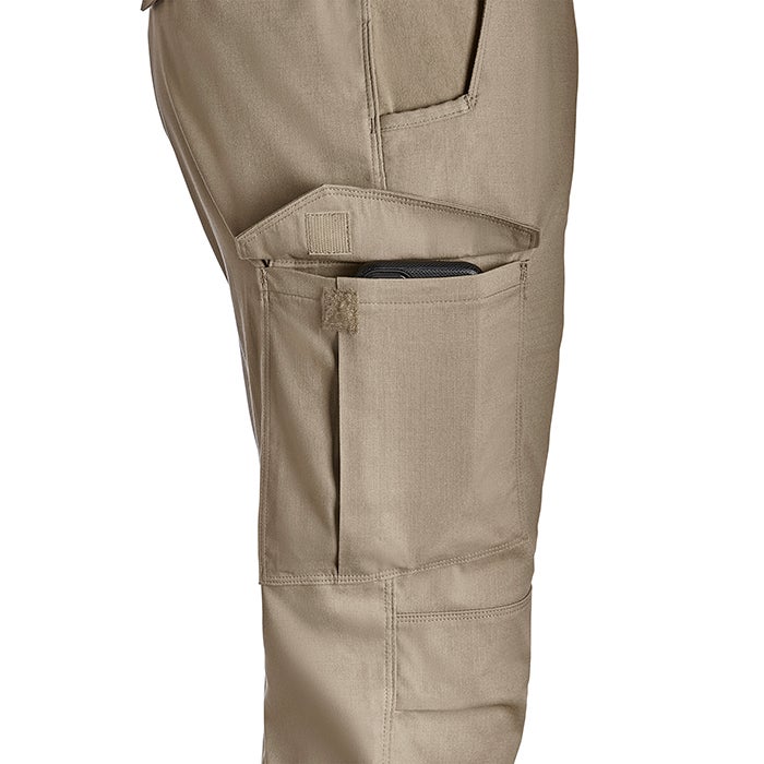 Product shot of tan cargo pants showcasing multiple pockets a cell phone in a secure pocket and subtle stitching details
