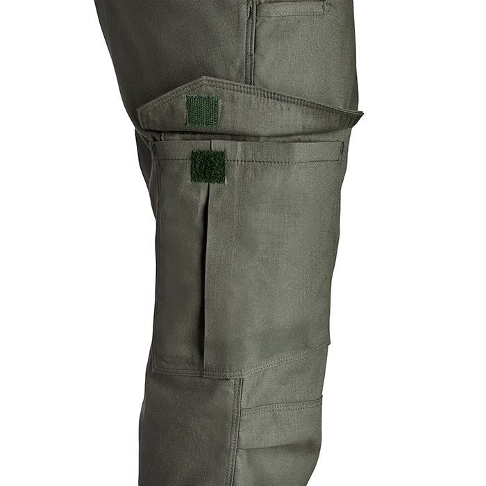 Product shot showing olive green cargo pants with multiple pockets and dark green velcro closures
