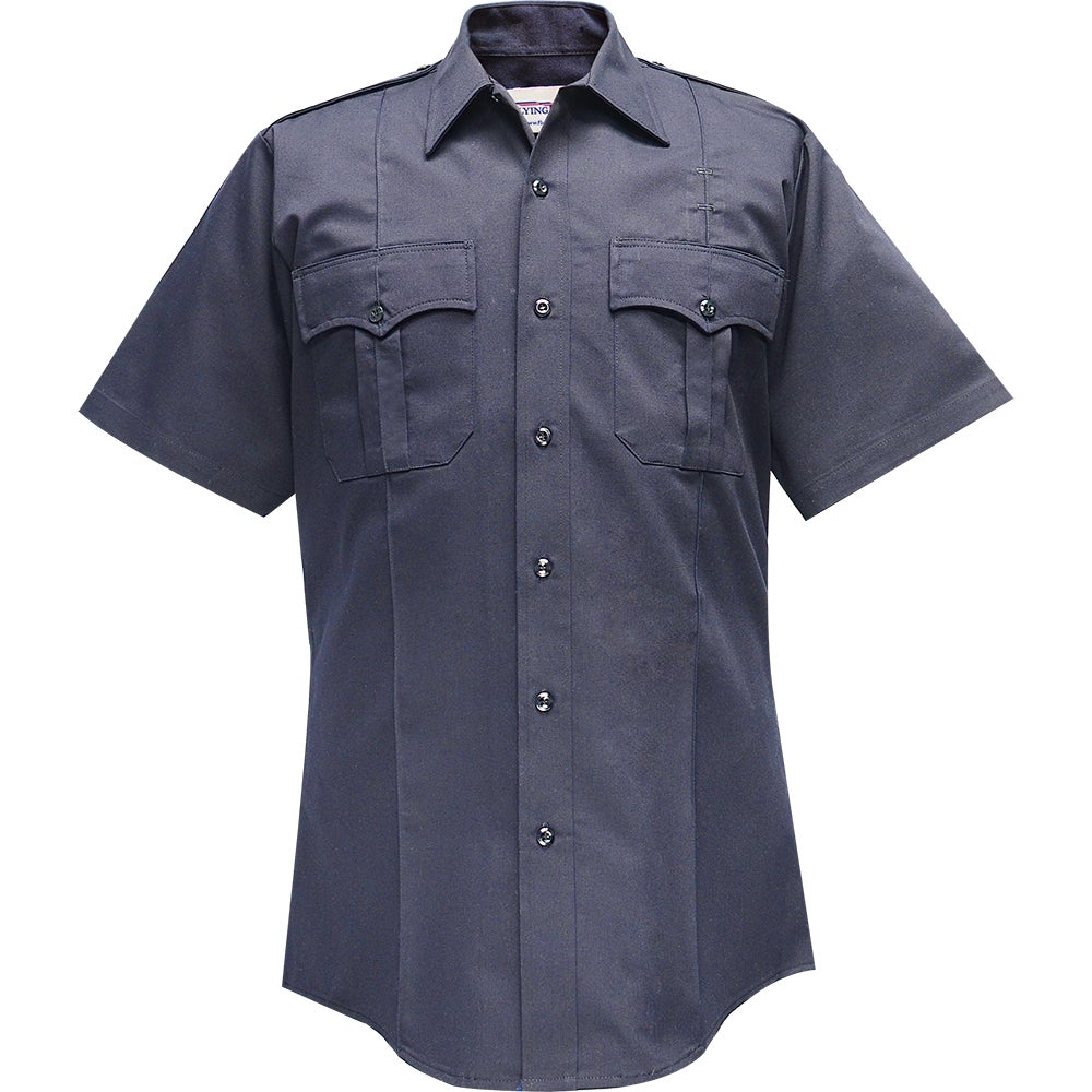 Product shot of a dark navy blue short-sleeved uniform shirt featuring two chest pockets with flaps and a button-down front featuring dark buttons and a subtle sheen on the fabric
