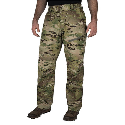 Product shot of camouflage pants featuring a zippered pocket, reinforced knees, and a multi-toned pattern of greens, browns, and tans.
