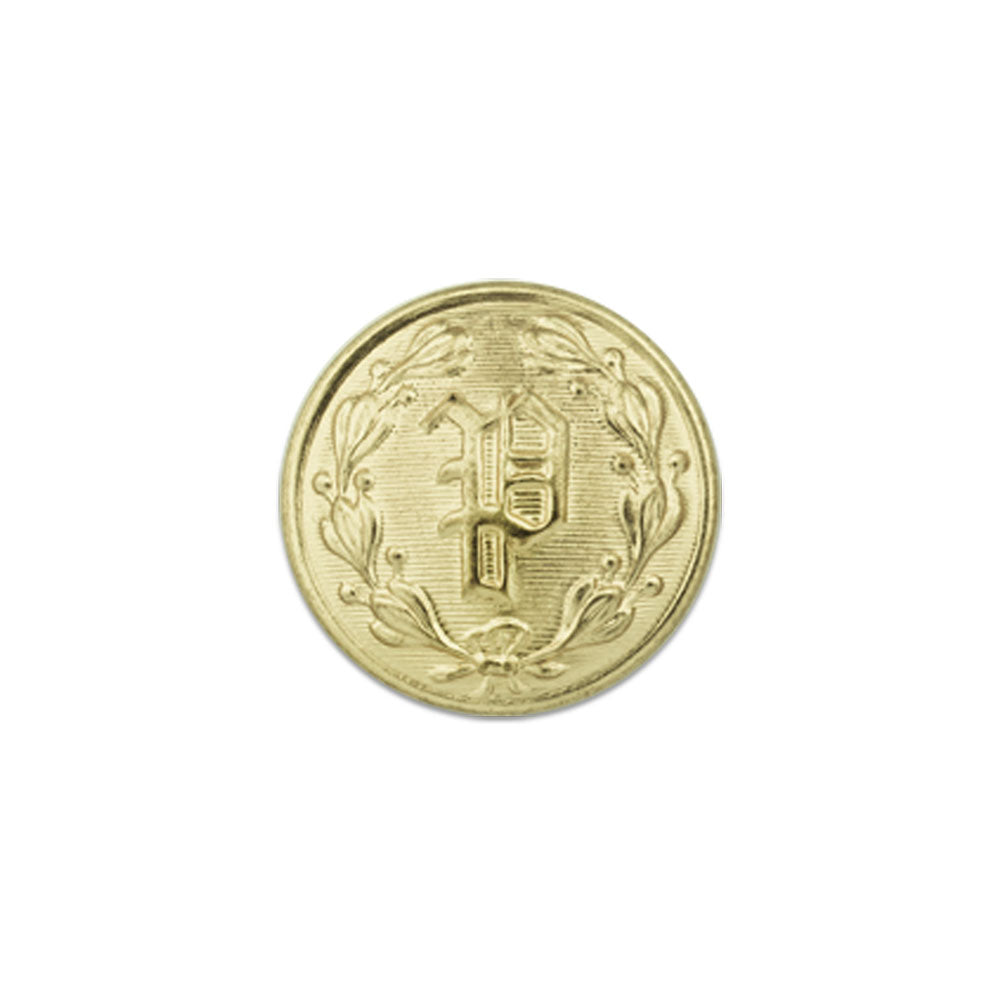 A gold-colored metal button featuring a central embossed capital P surrounded by a laurel wreath with detailed leaves and a textured background
