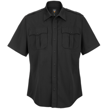 Product shot of a Flying Cross black short-sleeve uniform shirt featuring two chest pockets with button flaps and a branded label showing a dark logo on a light background