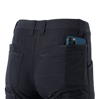 Product shot showing dark navy pants with multiple pockets a smartphone in a back pocket and detailed stitching
