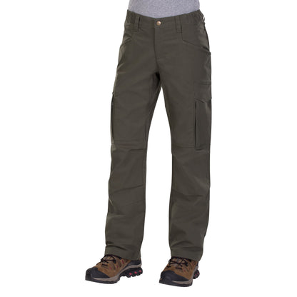 Product shot of olive green cargo pants with multiple pockets and brown hiking boots featuring red accents and a dark sole
