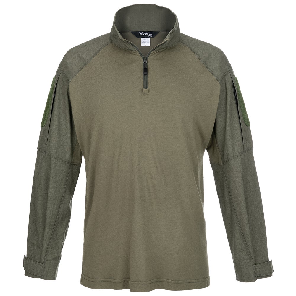 Product shot of XVERTEX long-sleeve shirt in olive green featuring reinforced shoulders and Velcro patches a half-zip closure and a textured fabric
