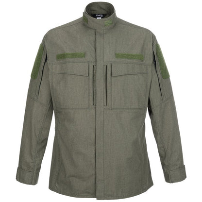Product shot of a Xvert olive-green tactical shirt featuring two zippered pockets, adjustable cuffs, and subdued olive-green Velcro patches