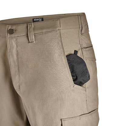 Product shot showing tan Xvertx Pro pants with a black pocket insert and multiple pockets featuring a button and a branded waistband
