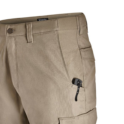 Product shot showing a close-up of beige Vertex tactical pants with a knife in a pocket featuring a button fly and cargo pockets