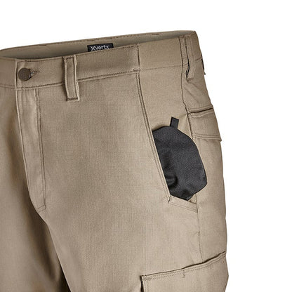 Product shot of tan Vertex tactical pants showing a cargo pocket a black fabric item inside and a branded waistband
