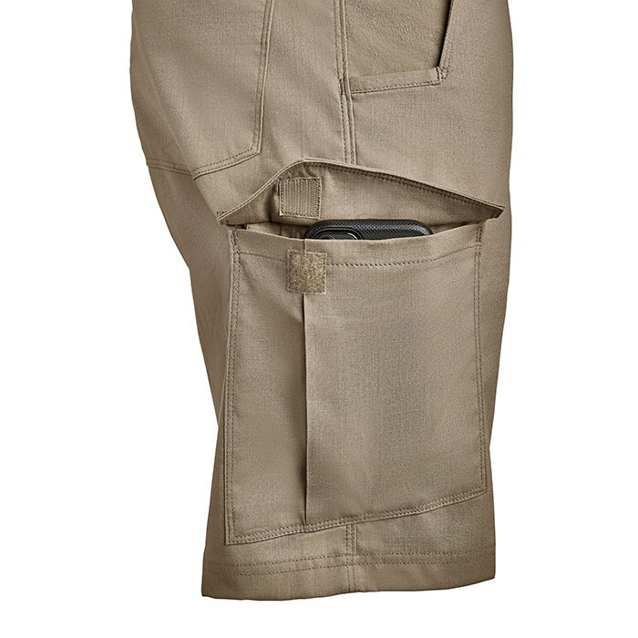 Product shot showing tan tactical pants with multiple pockets including a Velcro-secured cell phone pocket a  large cargo pocket and a smaller utility pocket featuring subtle stitching detail
