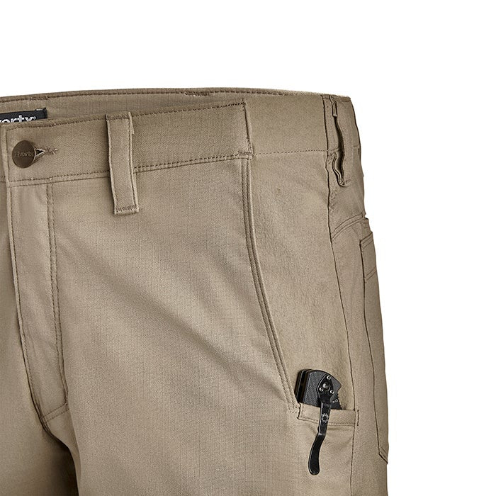 Close-up of khaki work pants featuring a utility pocket with a black folding knife subtle stitching and a reinforced waistband
