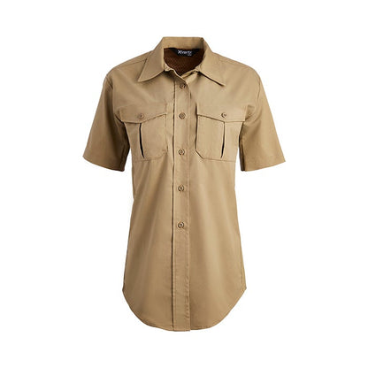 Product shot of a tan Xerta women's short sleeve shirt featuring button closures, two chest pockets, and a slightly curved hemline
