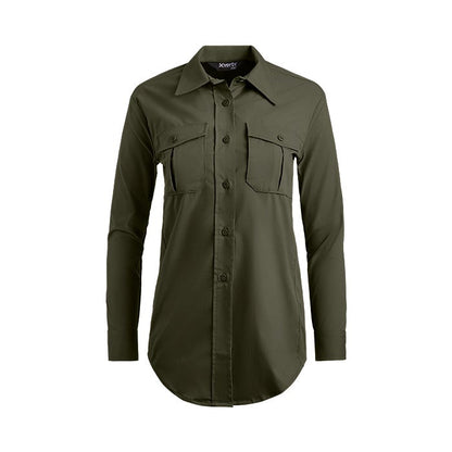 Product shot of a women's olive green Xpert long sleeve shirt featuring a collared button-down front and two chest pockets with button closures, showing a curved hemline and subtle texture
