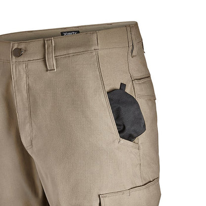 Close-up product shot of tan Xerty cargo pants showing a side pocket with a black accessory a button fly and detailed stitching
